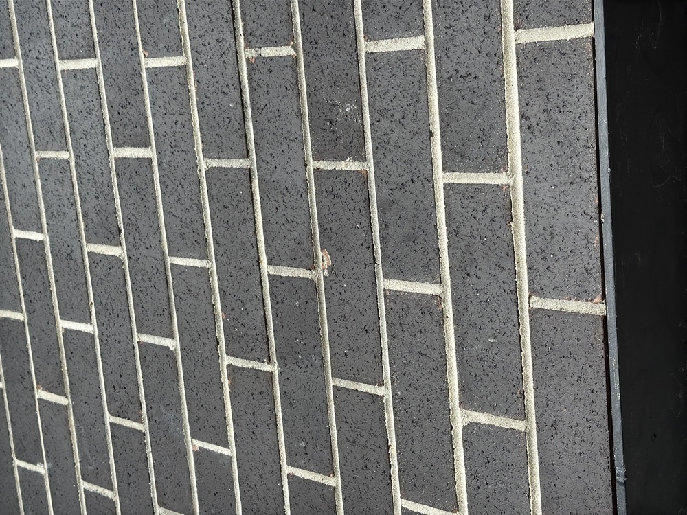 Chipped and damaged face bricks across the elevation, found during a defect investigation in Berwick, 10 km from Clyde