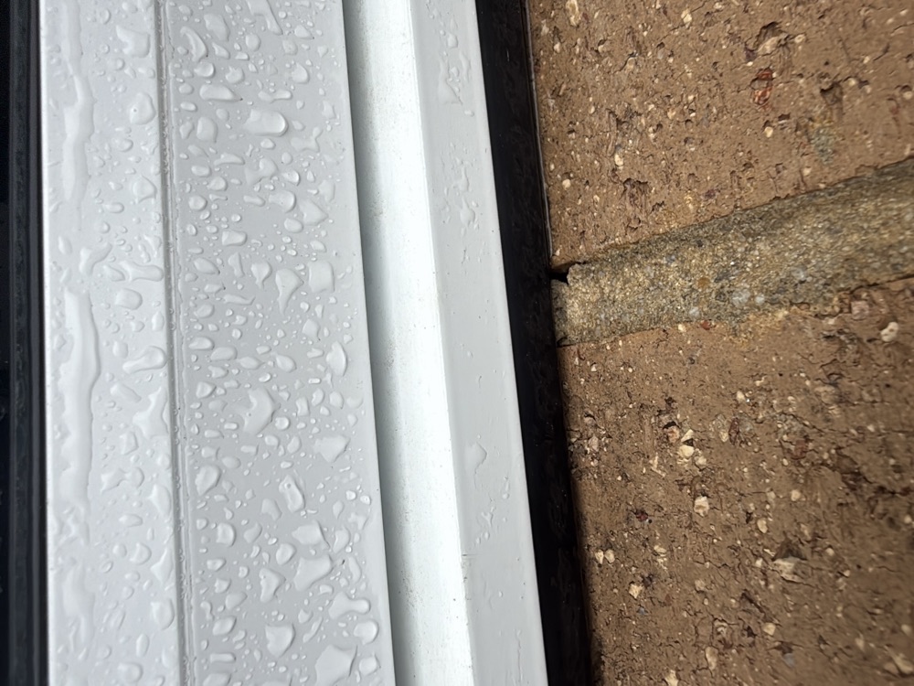 Gaps in the brick mortar under the window sills, found during a pre-handover inspection in Clyde