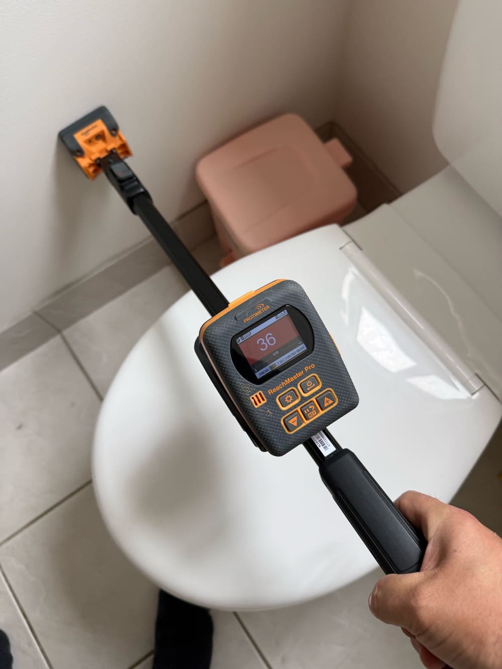 Moisture readings on shower walls, Berwick, Clyde