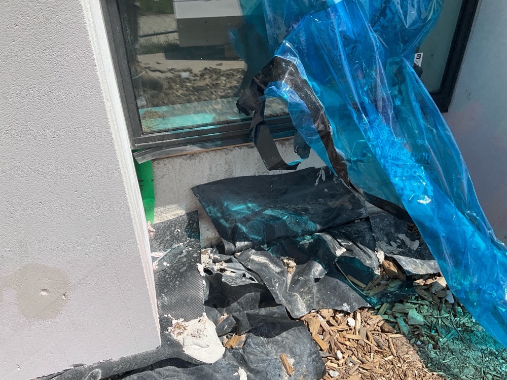 Sealing and flashing of windows incomplete at inspection, Clyde