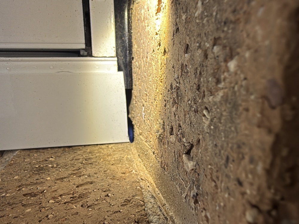 Rubber weather seal missing from a section of window, found during a pre-handover inspection in Clyde
